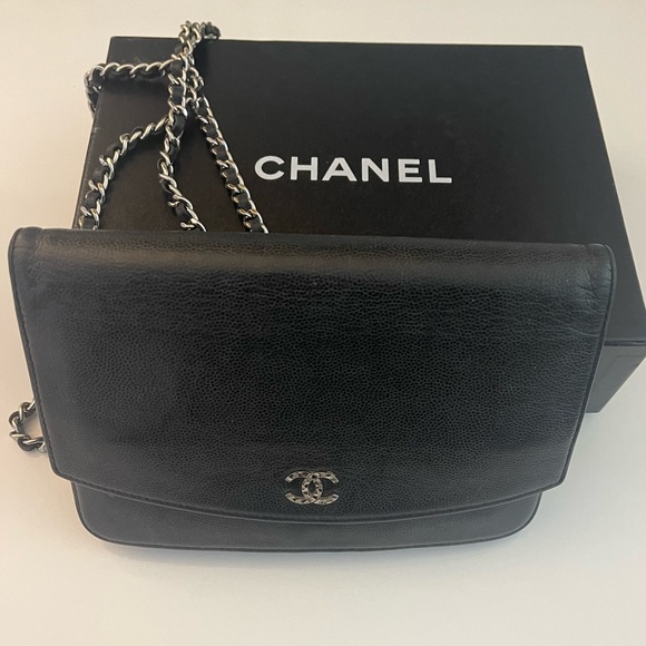 CHANEL Handbags - CHANEL Caviar classic WOC wallet on chain black.